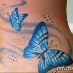 Фото тату двух голубых бабочек на лодыжке. Нежный дизайн, реалистичное изображение, блестки, татуировка для девушек.