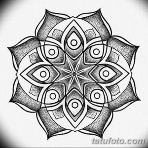 Фото тату: мандала, выполненная в технике dotwork, с использованием только точек. Подходит для эскиза татуировки на предплечье или лопатку.