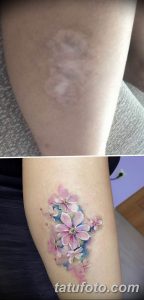 Фото тату с акварельными цветами на ноге, выполненное для маскировки шрама. Нежные пастельные тона и размытые контуры.