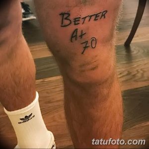 Фото тату на ноге: надпись "Better A+ 70", выполненная простым черным шрифтом.
