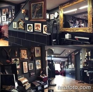 Фото тату-студии в винтажном стиле с множеством картин, старинных предметов и уютной атмосферой. Идеальное место для любителей классических татуировок.
