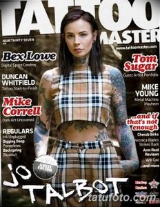 Фотография Джо Тальбот на обложке журнала Tattoo Master. Видна ее татуировка на руке и яркий наряд.