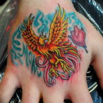 Фото тату феникс на руке 18.07.2019 №003 - tattoo phoenix on hand - tatufoto.com