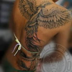 Фото тату феникс на спине 18.07.2019 №005 - phoenix tattoo on the back - tatufoto.com