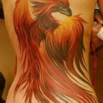 Фото тату феникс на спине 18.07.2019 №029 - phoenix tattoo on the back - tatufoto.com