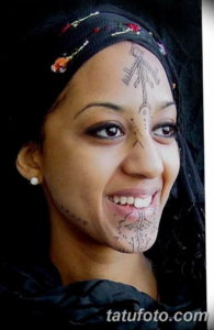 Фото красивые тату на лице 12.08.2019 №032 - beautiful face tattoos - tatufoto.com