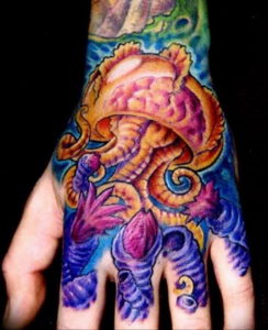 Фото тату океан на руке 13.08.2019 №003 - ocean tattoo on hand - tatufoto.com