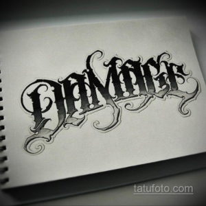 Black and grey calligraphy tattoo sketch of the word 'Damace' with bold lettering, shading, and decorative swirls. Dynamic and striking design.