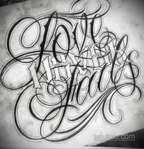 Black and grey calligraphy tattoo featuring the words 'Love and Hate' intertwined with intricate swirls and flourishes. Detailed line work and shading create a dramatic effect.