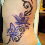 фото женской тату с цветами 21.10.2019 №026 - female tattoo with flowers - tatufoto.com