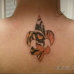 фото рисунка тату с геральдической лилией 14.12.2019 №053 -heraldic lily- tatufoto.com