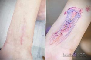 Фото тату: красивая татуировка медузы с бабочками, выполненная в акварельном стиле на руке. Нежные цвета и плавные линии.