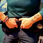 Фото действующего сотрудника полиции в форме с татуировками на теле для tatufoto.com 33
