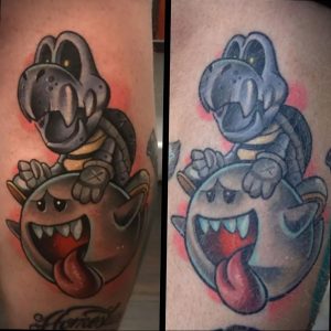 Фото тату на руке с изображением персонажей из игры Mario – Bowser и Boo. Яркий рисунок татуировки в мультяшном стиле.
