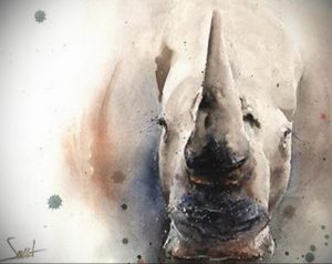 Эскиз татуировки носорога, выполненный в акварельной технике. Мягкие переходы цветов и реалистичное изображение создают нежный и запоминающийся рисунок.