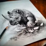 вариант эскиза тату носорог 02.02.2020 №1129 -rhino tattoo sketches- tatufoto.com
