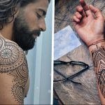 Фотография двух татуировок в стиле хенна: на плече и предплечье, выполненных в черном цвете с использованием геометрических узоров.