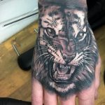 Фото рисунка тату оскал тигра 05.02.2020 №055 -tiger grin tattoo- tatufoto.com