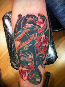 Фото рисунка тату оскал пантеры 05.02.2020 №055 -panther grin tattoo- tatufoto.com
