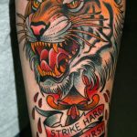 Фото рисунка тату оскал тигра 05.02.2020 №012 -tiger grin tattoo- tatufoto.com