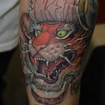 Фото рисунка тату оскал тигра 05.02.2020 №020 -tiger grin tattoo- tatufoto.com