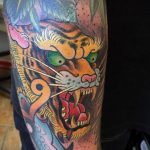 Фото рисунка тату оскал тигра 05.02.2020 №038 -tiger grin tattoo- tatufoto.com