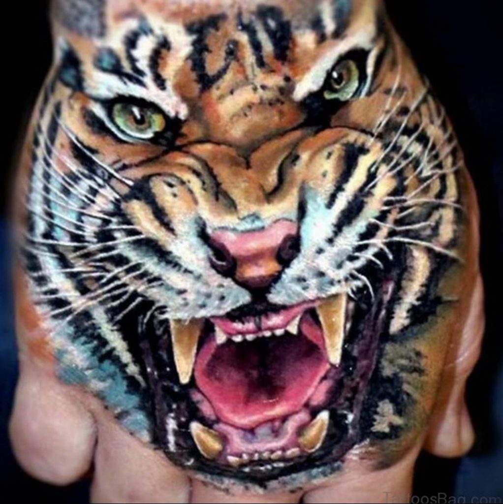 Фото рисунка тату оскал тигра 05.02.2020 №051 -tiger grin tattoo- tatufoto.com