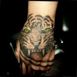 Фото рисунка тату оскал тигра 05.02.2020 №059 -tiger grin tattoo- tatufoto.com