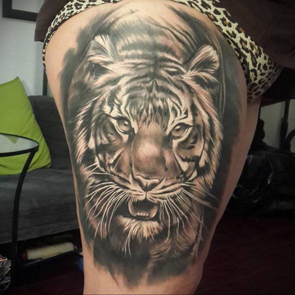 татуировки оскал тигра на плече значение