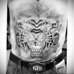Фото рисунка тату оскал тигра 05.02.2020 №074 -tiger grin tattoo- tatufoto.com