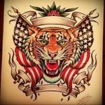 Фото рисунка тату оскал тигра 05.02.2020 №075 -tiger grin tattoo- tatufoto.com