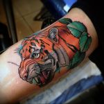 Фото рисунка тату оскал тигра 05.02.2020 №087 -tiger grin tattoo- tatufoto.com