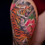 Фото рисунка тату оскал тигра 05.02.2020 №089 -tiger grin tattoo- tatufoto.com