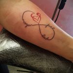 Фото тату: татуировка бесконечности на руке с именами 'morgan', 'joel' и 'dad', украшенная изображением сердца.