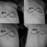 Фото тату бесконечность с летящими птицами и надписями 'Forever', 'Always', 'Dream', 'Love' на предплечьях.