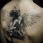 Фото тату с ангелом на спине 12.03.2020 №006 -angel tattoo on the back- tatufoto.com
