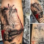 Фото тату на руке: раскрытая книга с сигарой и пепельницей, выполненная в реалистичной черно-белой графике с красными акцентами. Мужественный рисунок татуировки для любителей сигар.