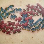 Фото татуировки пазл ко дню аутистов 02.04.2020 №073 -autism puzzle tattoo- tatufoto.com