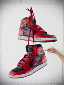 Фото эскиза тату: гиперреалистичный рисунок пары кроссовок Nike Air Jordan, выполненный в деталях. Идеально для любителей баскетбола и уличной моды.