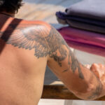 Фрагмент татуировки ангел с мечом на руке парня – Уличная татуировка (Street tattoo) № 04 – 12.06.2020 для tatufoto.com 2
