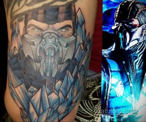 Фото татуировки персонажа Sub-Zero из Mortal Kombat на руке. Детализированный рисунок с использованием синих и голубых оттенков, ледяные кристаллы.