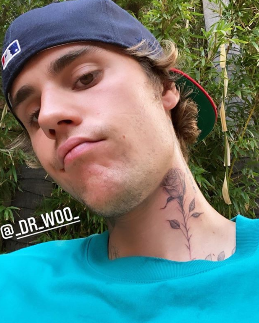 Новая татуировка с розой на шее Джастина Бибера от звездного мастера тату – доктора Ву