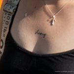 Тату надпись STRONG на грудине девушки -Уличная тату-street tattoo-21.09.2020-tatufoto.com 2
