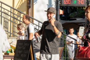 Фото татуировок на руке мужчины, выполненных в темных тонах. Рисунок татуировки включает в себя различные символы и элементы.