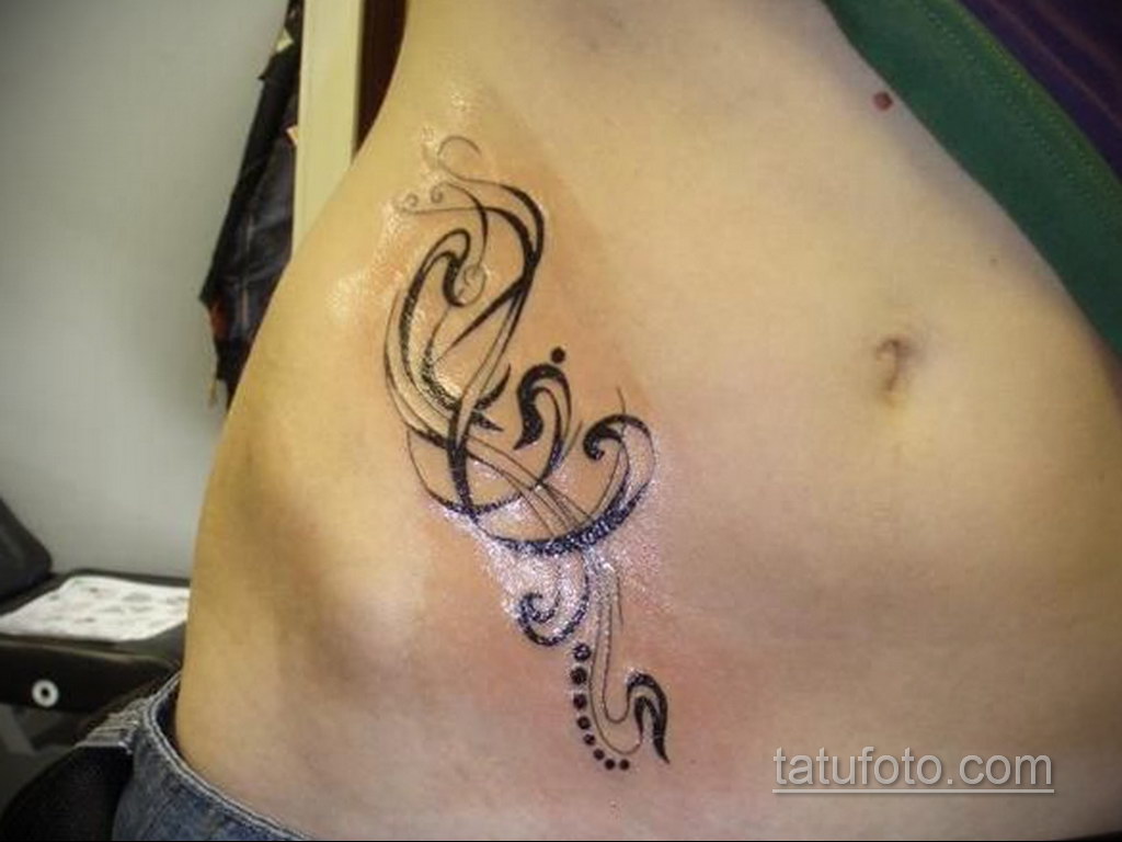 Фото женской тату на животе 16.11.2020 № 053 -Female tattoo on her stomach-...