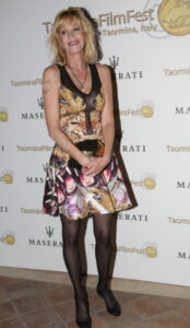 Мелани Гриффит тату - Melanie Griffith tattoo - фото 2