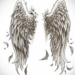 Черно-белый эскиз татуировки с изображением двух больших ангельских крыльев. Детализированный рисунок, выполненный в стиле графики.