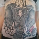 Фото женской тату на животе 16.11.2020 №061 -Female tattoo on her stomach- tatufoto.com