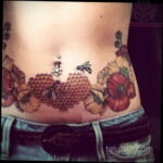 Фото женской тату на животе 16.11.2020 №075 -Female tattoo on her stomach- tatufoto.com