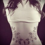 Фото женской тату на животе 16.11.2020 №077 -Female tattoo on her stomach- tatufoto.com